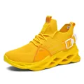 Vibrant yellow breathable knit running shoes with unique blade sole and buckle detail - 36 / Yellow