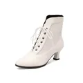 Elegant white Victorian style lace-up ankle boots featuring floral lace panels and a pointed toe - 33 / White