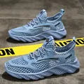 Scarpe da corsa da uomo in rete traspirante celeste con suole ammortizzate spesse - 40 / Blu