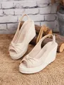 Detalle de sandalias de cuña beige con plataforma de cuerda de paja y nudo - 34 / Albaricoque