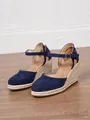 Detail of navy blue suede closed-toe wedge sandals with braided rope heel and ankle strap - 34 / Dark Blue