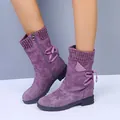 Detailed view of purple mid-calf boots featuring a knitted collar and stylish side zipper - 35 / Purple