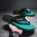 Modische Herren-Flip-Flops in Schwarz und Türkis mit gewebtem LOULUEN-Markenriemen - Größe 39 / 226 Stil (902834) / Türkisgrün