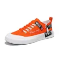 Stylish orange canvas platform sneaker for men with side zipper and decorative patches. - 39 / Orange