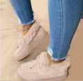 Detail view of pink plush suede snow boots featuring warm fur lining and thick soles - 35 / Beige