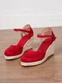 Close-up detail of red suede closed-toe espadrille wedge sandals with ankle strap - 34 / Red
