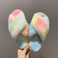 Detail view of colorful rainbow fuzzy slippers with a plush cross-strap design for indoor use - 38 / Rainbow