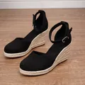 Elegant black espadrille wedge sandals with round toe and adjustable ankle strap for women. - 34 / Black
