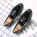 Men's elegant black slip-on loafers featuring a velvet vamp and classic twin tassel accents. - 38 / Black