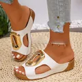 Elegant white open-toe wedge sandals for women featuring a stylish large gold buckle - 36 / White