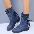 Detailed view of blue mid-calf women's boots with a knitted cuff and side zipper - Dark Blue