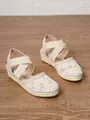 Detalle de alpargatas de cuña beige con bordado floral y correas cruzadas - 34 / Estilo de Paja con Bordado Floral / Albaricoque