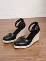 Elegant black women's wedge espadrille sandals featuring ankle strap and straw heel - 38 / Black