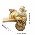 Statuetta Babbo Natale in resina dorata da scaffale, decorazione natalizia lunga 21,5 cm - Babbo Natale Pigro (RRW3124-GD) / Oro