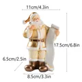 Statuina di Babbo Natale in resina dorata dipinta a mano con misure per decorazione - Babbo Natale che scrive la lista - Piccolo (RRW120-GD-S) / 11x6.5x17.5cm / Oro