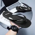 Schwarze leichte Herren-Strand-Flip-Flops mit CRAZYSURF-Logo und rutschfestem Design - 38 / Schwarz Weiß