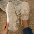 Detailed view of beige lace mesh sneakers featuring intricate floral patterns and white soles - 36 / Beige