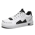 Stylish white leather sneaker for men with black panels and edgy metallic silver studs - 40 / Studded Casual Board Shoes (21258) / White