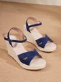 Navy blue suede wedge sandals with espadrille platform sole and ankle strap. - Dark Blue