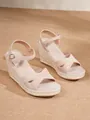 Elegant beige suede wedge espadrille sandals featuring an adjustable ankle strap and rope sole - Apricot