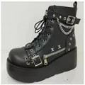 Detailed side view of black gothic platform boots with metal chains and buckle straps - 35 / Matte Black (601)