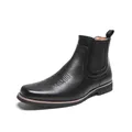 Klassischer schwarzer Chelsea-Stiefel aus Leder mit Schnitzereien und Elastikseite - 38 / Schwarz