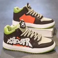 Sneakers alte da uomo in marrone e arancione con dettagli patch cartoon e suola spessa - 40 / Beige Marrone