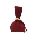 Elegante burgunderrote Samt-Beuteltasche mit raffiniertem goldenem Ringgriff-Detail - Handtasche Stil / Rot