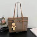 Minimalist brown pebble leather tote bag with a cute teddy bear charm accessory - With Pendant / Brown