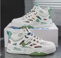 Trendy white high-top sneakers with green accents and colorful retro mesh panels - White Green