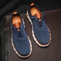 Αναπνέοντα μπλε ανδρικά casual sneakers από πλεκτό ύφασμα με κομψές δερμάτινες λεπτομέρειες - 40 / Σκούρο μπλε