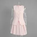 Elegant pink sleeveless waistcoat and matching tulip mini skirt set on clear mannequin - S / Top And Bottom / Pink