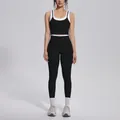 Full body view of a black and white color-blocking ribbed yoga set for women - S / Top And Bottom / Premium Black