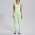 Full view of mint green ribbed yoga set featuring high waist leggings and sports bra - S / Top And Bottom / Mint Green