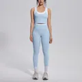 Studio shot of a light blue color block yoga set featuring high waist ribbed leggings - S / Top And Bottom / Mist Blue
