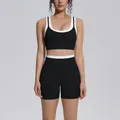 Front view of professional black and white contrast ribbed high waist yoga set for women - S / Top And Bottom / Premium Black