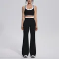 Full body view of a black and white color-blocked ribbed high-waisted yoga set on model - S / Top And Bottom / Premium Black