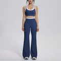 Front view of navy blue and white contrast yoga set with high-waisted flared pants - S / Top And Bottom / Badge Blue