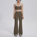 Full body view of olive green yoga set with contrast white trim and flare pants - S / Top And Bottom / Coffee