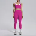 Full body view of a vibrant pink and white contrast yoga set with high-waist leggings - S / Top And Bottom / Dragon Fruit