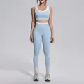 Full view of the light blue color-block yoga set with high-waist leggings on a model. - S / Top And Bottom (7154) / Mist Blue