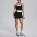 Black and white contrast ribbed yoga set with high waist crop top and sports skirt - S / Top And Bottom / Premium Black