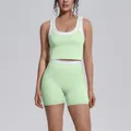 Women's mint green layered sports yoga set with high-waisted shorts and cropped tank top - S / Top And Bottom / Mint Green