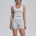 Two-piece grey yoga set with white color-block ribbed tank top and high-waist shorts - S / Top And Bottom / Tank and Shorts Set / Clay Grey