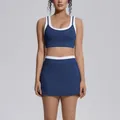Navy blue contrast ribbed yoga set with sports bra and high-waisted athletic tennis skirt - S / Top And Bottom / Badge Blue