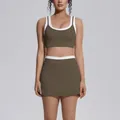 Olive green yoga set featuring a contrast white trim sports bra and high waist skirt - S / Top And Bottom / Coffee