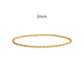 Macro detail of a 2mm gold beaded stainless steel elastic bracelet - 2.0mm / Gold