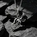 Gothic skull and dagger pendant necklace in stainless steel on textured rocks - Skull Pendant With Cross Chain / ce482-3x60cm