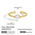 Anello regolabile in acciaio inossidabile con zircone a goccia e finitura martellata - Stile Aperto Zirconia a Goccia Martellato (JDR0203318) / Oro