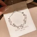 Eleganteres mehrlagiges Perlenarmband mit Silberperlen für Damen im minimalistischen Stil - Dreilagige Feine Kette Verstellbarer Stil (58) / Silber-Rosa